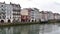 BAYONNE, FRANCE - Old houses by the river La Nive in the center of Bayonne, Aquitaine, France