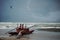 Baywatch boat on a beach in Italy, Europa. Bird fling over the sea.