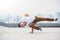 Bboy doing some stunts on the roof