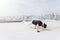 Bboy doing some stunts. Street artist breakdancing outdoors