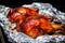 bbq chicken drumsticks wrapped in aluminium foil