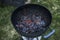 BBQ Grill Pit Glowing And Flaming Hot Charcoal Briquettes coal Food Background Or Texture Close-Up Top View
