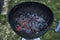 BBQ Grill Pit Glowing And Flaming Hot Charcoal Briquettes coal Food Background Or Texture Close-Up Top View