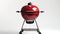 a BBQ session with a high-resolution photograph showcasing a BBQ grill against a crisp white background, offering a