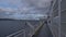 BC Ferries vessel MV Northern Expedition passing Calvert Island on cloudy day in autumn with empty deck.