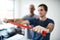 Be careful not to hurt yourself. a physiotherapist helping a patient stretch with resistance bands.