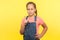 Be careful! Portrait of smart bossy little girl in denim overalls standing with admonishing gesture