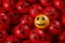 Be Happy Concept. Smile Emoji Between A Bunch of Angry Emoticons. 3D Rendering