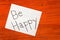 Be Happy- Post it Note on Wood Background