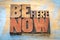 Be here now word abstract in wood type