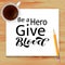 Be a Hero Give Blood lettering with wooden background. Vector illustration
