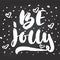 Be jolly - hand drawn Christmas and New Year winter holidays lettering quote isolated on the black chalkboard background