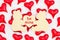 Be mine message on wood bear sign with red hearts on white fabric