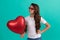 be my valentine. teen girl with party balloon. love present. serious kid with love romantic gift