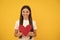 be my valentine. teen girl on yellow background. love present with copy space.