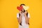 be my valentine. teen girl on yellow background. love present. positive kid with love romantic gift