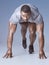 Be the one who went for it. Full length shot of a handsome young man crouched in a starters position in the studio.