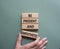 Be Present and Empathetic symbol. Concept words Be Present and Empathetic on wooden blocks. Businessman hand. Beautiful grey green