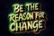 Be the Reason for Change - Vibrant Graffiti Style Motivational Quote on Dark Background