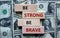 Be strong be brave symbol. Wooden blocks with words \\\'be strong be brave\\\'.