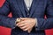 be in time. Blue suit and wristwatch on male hand cropped view. Mens wardrobe.