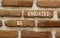 Be unbiased symbol. Concept words Be unbiased on red brown brick wall. Beautiful red brown brick wall background. Business