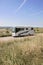 The beach and American style camping car parked on the Sussex Downs, England.