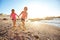 Beach babies. two little girls having fun on the beach.