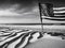 beach background monochromatic landscape stars and stripes of the American flag-Generative ai