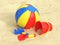 Beach ball and kids sand toys, bucket, shovel and rake in sand 3d rendering