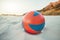 Beach, ball and volleyball on sand, a game at sunset at tropical ocean destination. Fitness, fun and summer sports at