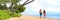 Beach banner caribbean vacation landscape couple walking, man, bikini woman relaxing on tropical destination for summer