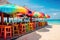 beach bar, with rows of colorful fruity drinks and umbrellas in the background