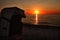 Beach Basket Chair at Sunset