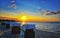 Beach with beach chairs and sunset in the background. Baltic Sea in Glowe. Mecklenburg-Western Pomerania, Germany