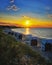 Beach with beach chairs and sunset on the Baltic Sea in Glowe. Mecklenburg-Vorpommern, Germany