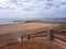 Beach beautiful seen on blue sea, golden sand, a sky with white cloud