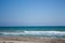 The beach of the Black sea. empty sandy beach with seashells. Blue sky