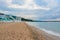 Beach of Black Sea from Golden Sands, Bulgaria with blue clear water, fluffy clouds sky, hotels