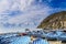 Beach with boats in the village Monterosso al Mare on shore of the Mediterranean Sea in Italy