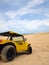 Beach buggy in sand dunes