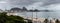 Beach, building, hotels, condos, mountains in Rio de Janeiro, Brazil on a cloudy day
