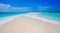 Beach in Caribbean with a sand pathway