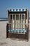 A beach chair with blue and white stripes