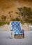 Beach chair at evening on the beach