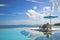 Beach chair with umbrella on private pool