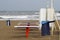 Beach with chairs and trashcans