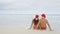 Beach Christmas couple relaxing on winter vacation