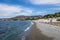 Beach in and city view at waterfront promenade lungomare - Reggio Calabria, Italy