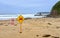 Beach closed signs on beach due to Tsunami warning